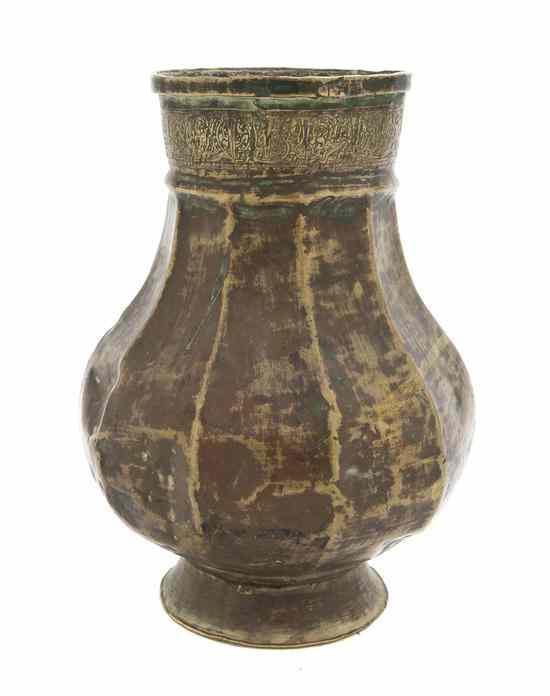 Appraisal: A Middle Eastern Silver Inlaid Brass Vase of faceted baluster