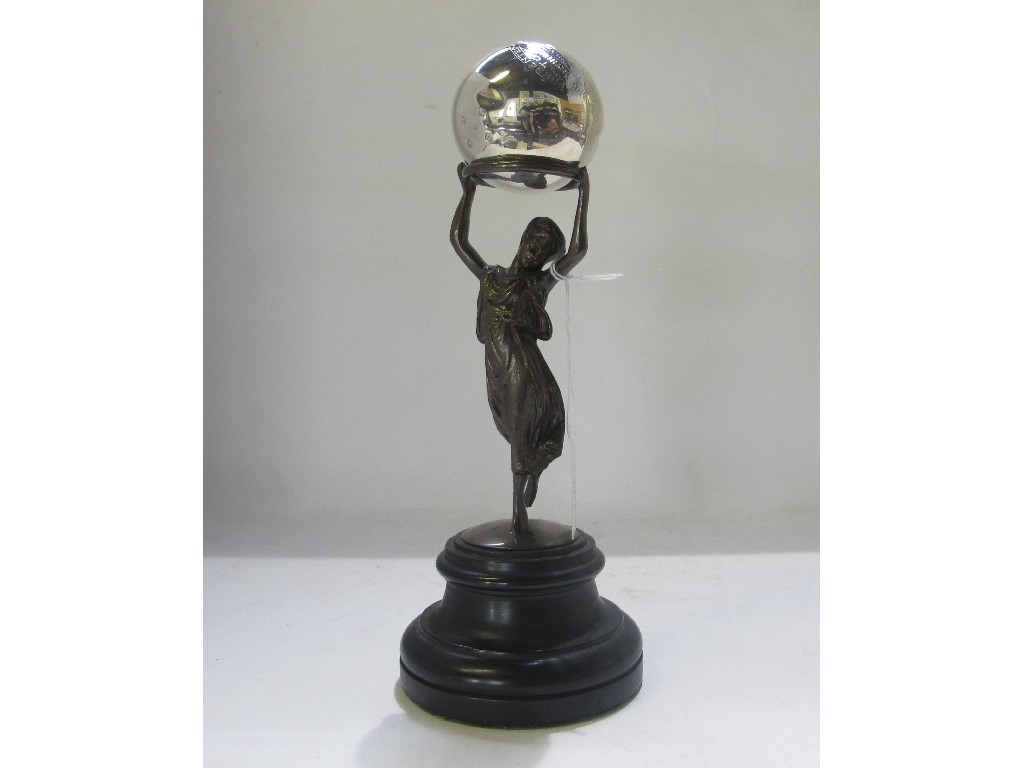 Appraisal: A silver bowling trophy jack on figural spelter stand glass