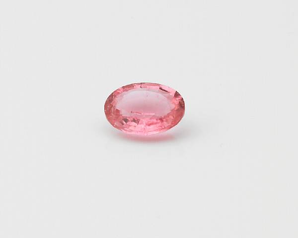 Appraisal: Pink Tourmaline An unmounted oval-cut pink tourmaline weighing approximately carats