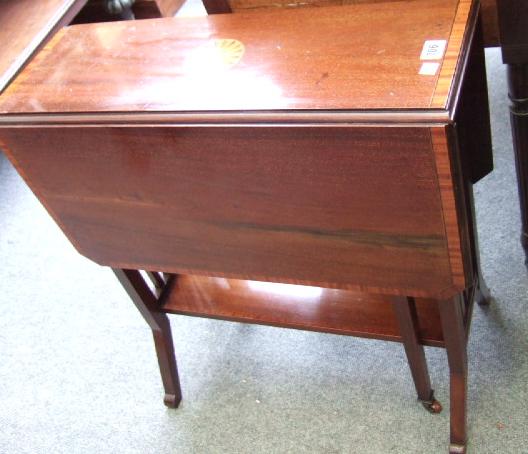 Appraisal: An Edwardian mahogany and satinwood banded drop flap Sutherland table