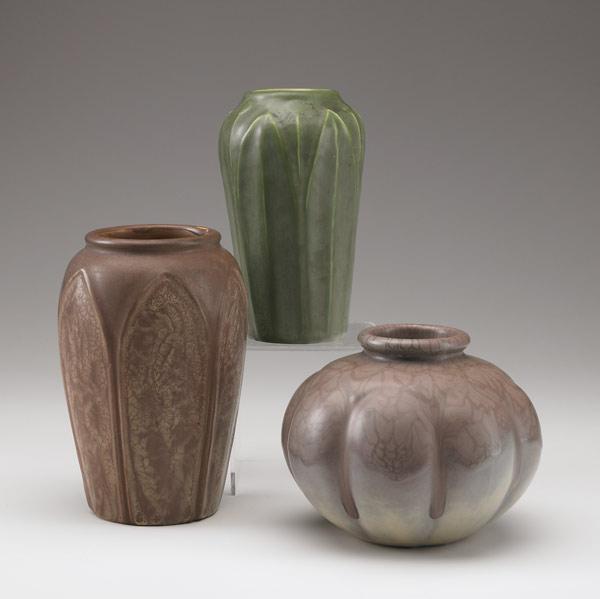 Appraisal: HAMPSHIRE Three vases in green or plum matte glaze Glazed-over