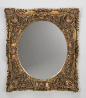 Appraisal: Carved Continental style composition mirror h Carved and paint decorated