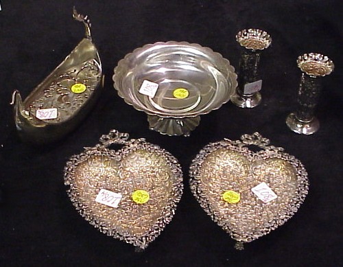 Appraisal: Sterling pair of footed heart-shaped dishes with overall repousse decoration