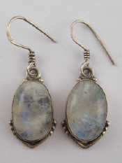 Appraisal: A pair of white metal tests silver drop earrings set