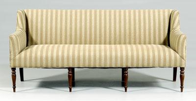 Appraisal: Federal mahogany upholstered sofa brown-striped upholstery and turned mahogany legs