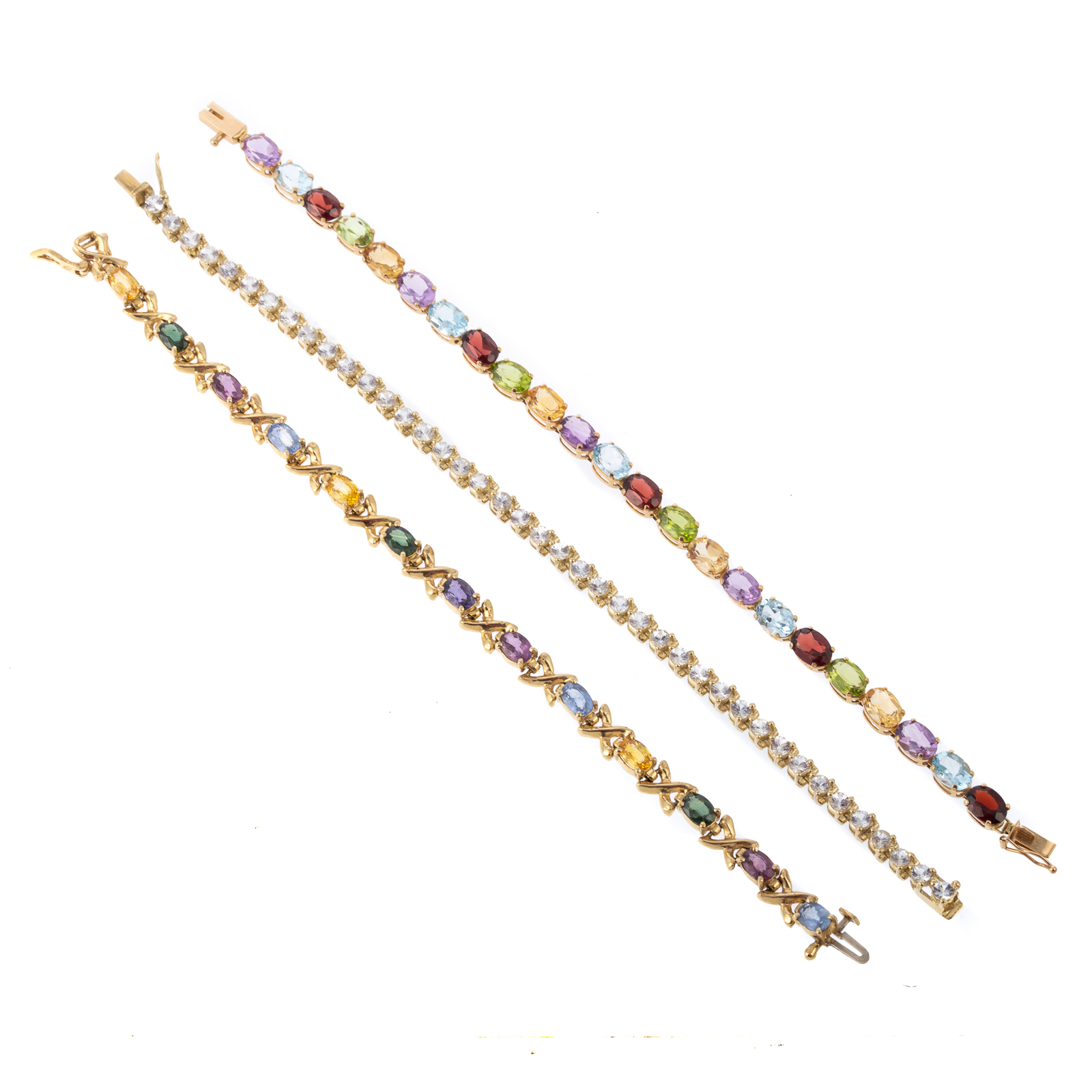 Appraisal: A TRIO OF MULTI-GEMSTONE LINK BRACELETS IN K K yellow