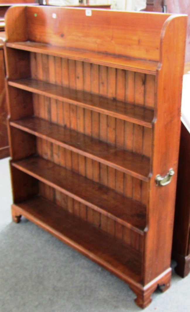 Appraisal: A th century fruitwood waterfall five tier bookcase on bracket