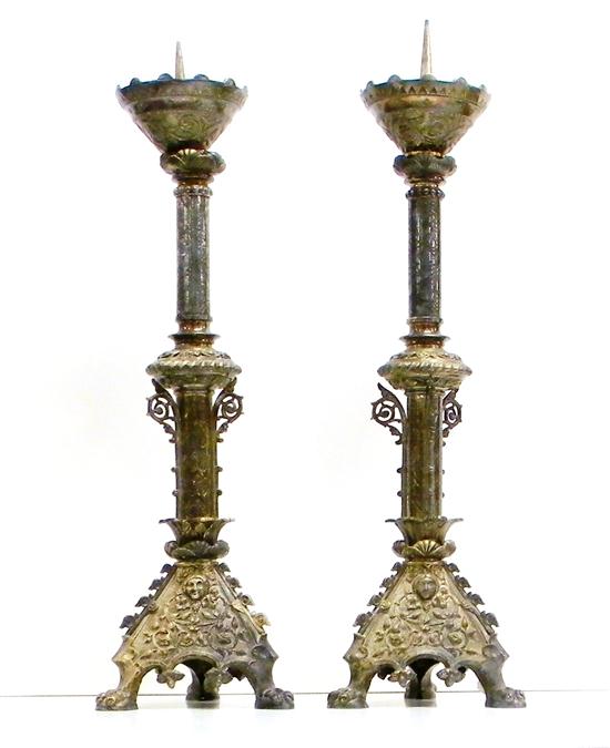 Appraisal: Pair th century silver plate pricket sticks with ornate relief