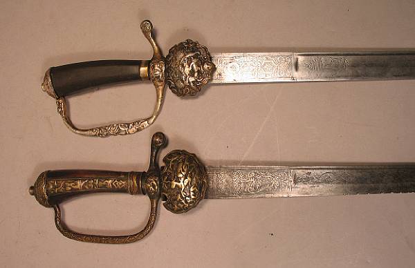 Appraisal: A lot of two continental hunting swords th century Comprising