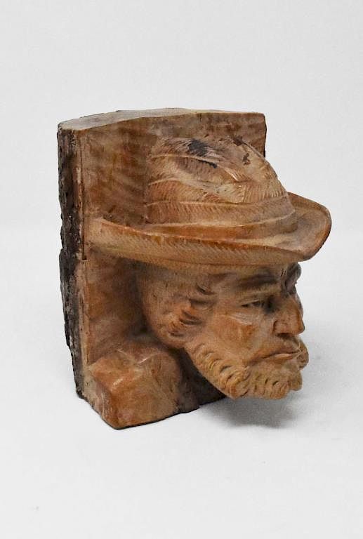 Appraisal: Wood carving Wood carving of a bearded man wearing a