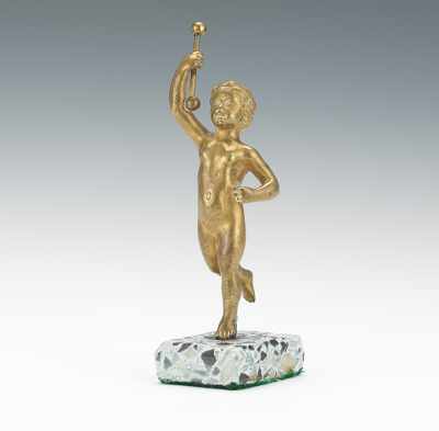 Appraisal: A Miniature Cast Bronze Figure of a Boy Continental cast