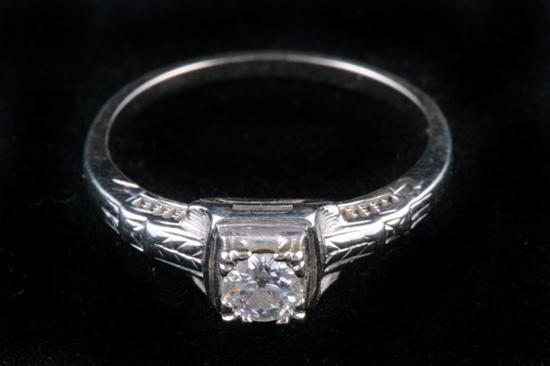 Appraisal: K WHITE GOLD AND DIAMOND RING Brilliant-cut round diamond weighing