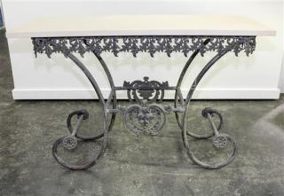 Appraisal: A French Iron and Marble Baker's Table Height x width