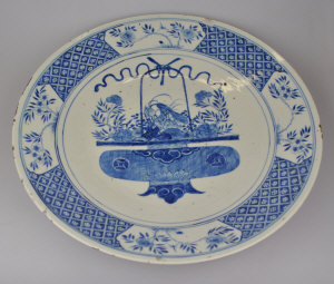 Appraisal: Chinese blue white dish decorated in centre with a vase