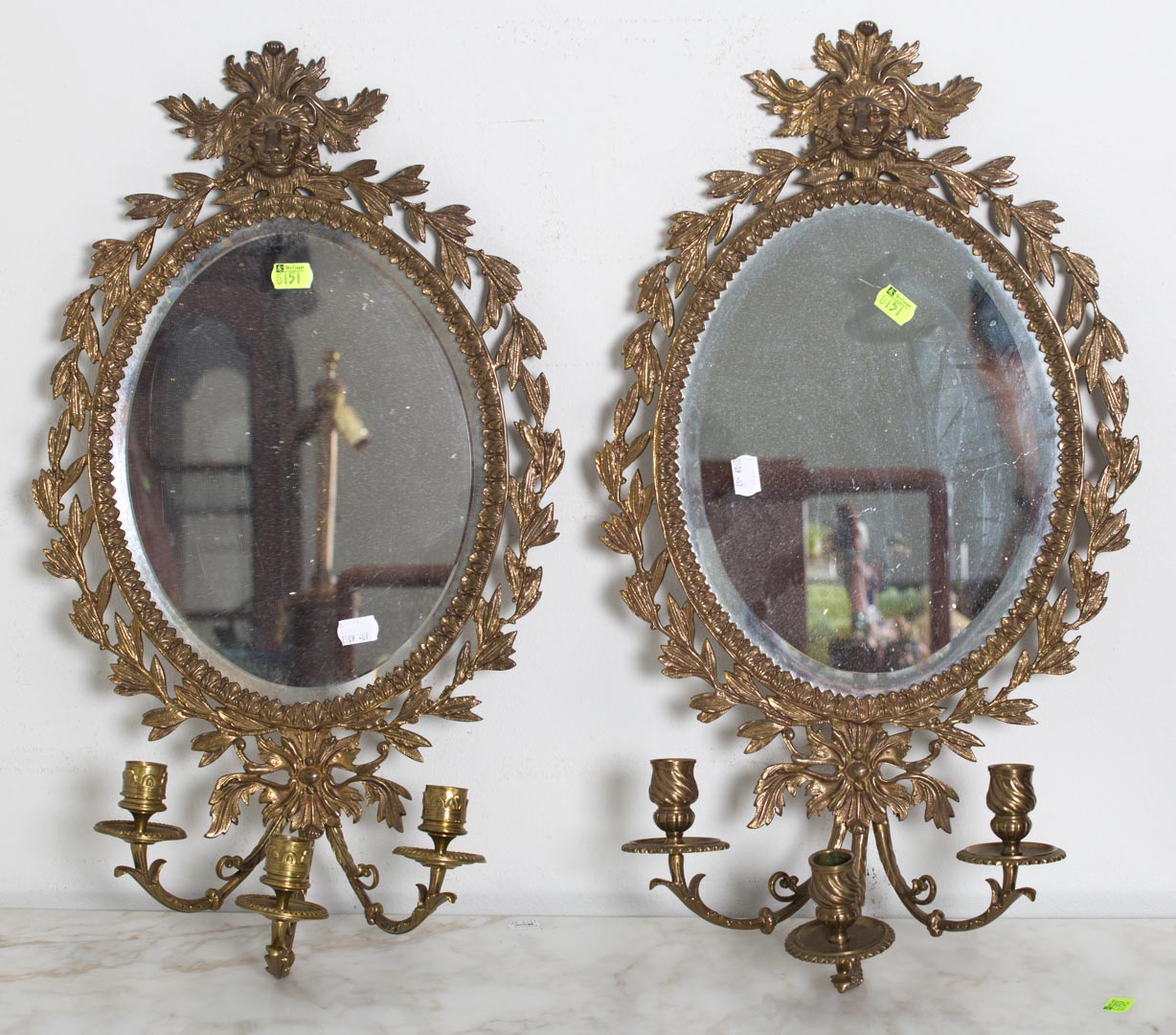 Appraisal: Pair of brass wall-mounted mirrors w candleholders