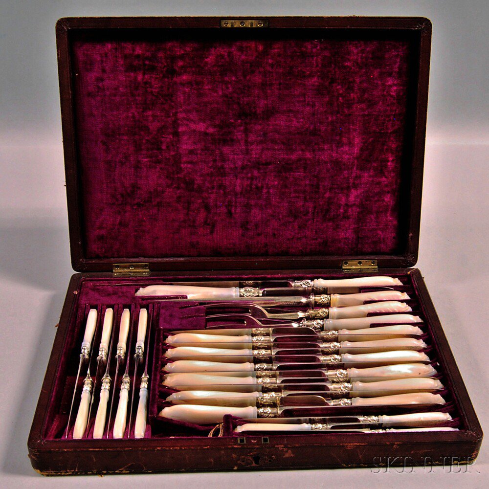 Appraisal: Cased Mother-of-pearl-handled Knife Set unmarked comprised of two carving sets