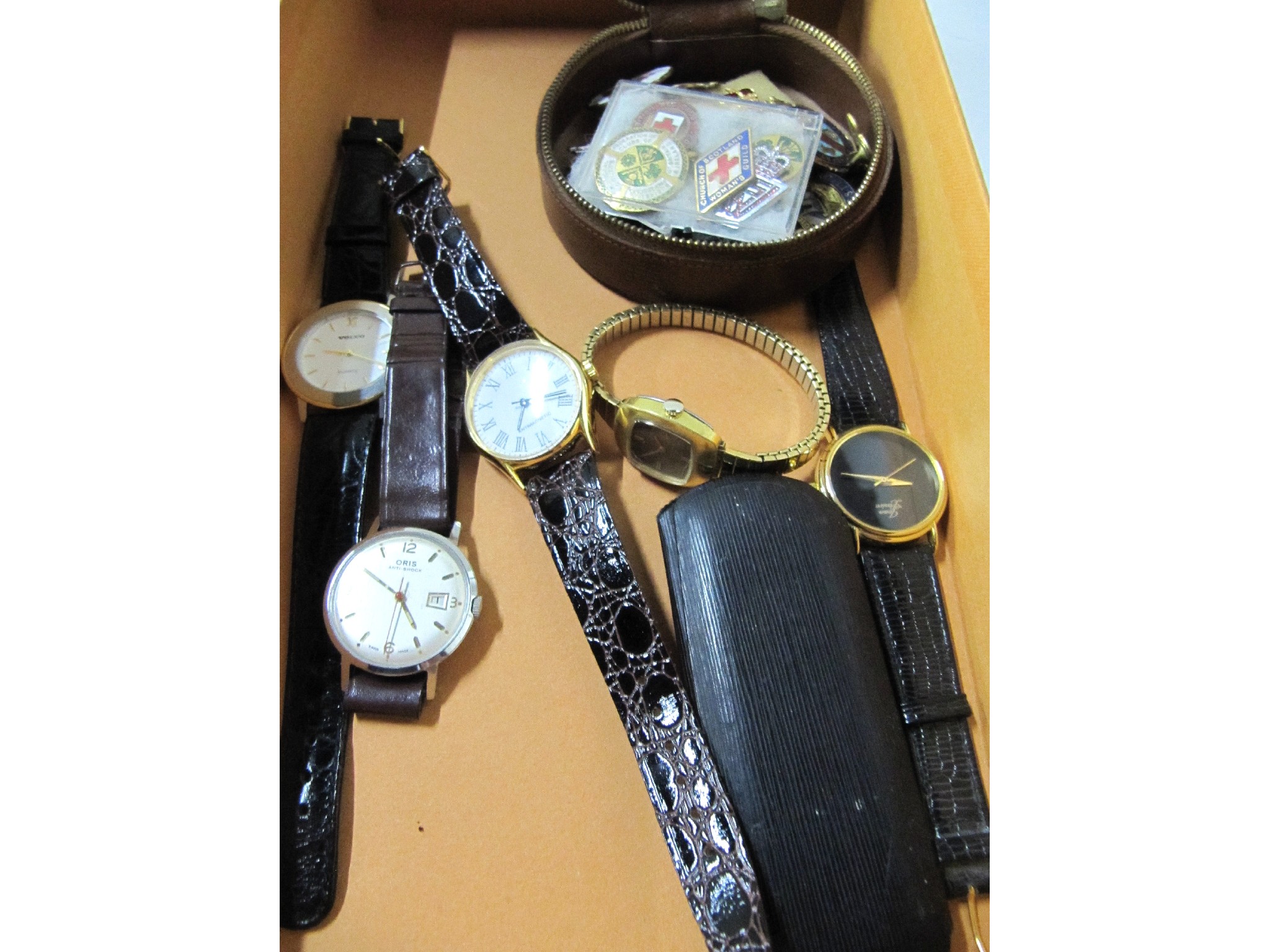 Appraisal: A box of assorted watches and enamel badges