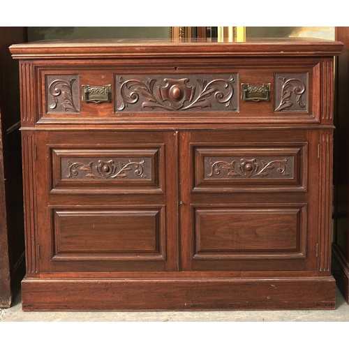 Appraisal: A Edwardian walnut secretaire bookcase with cabochon centred carved foliate