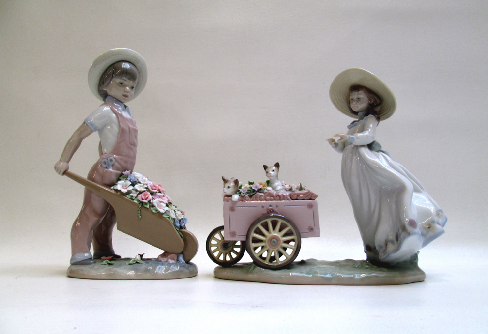 Appraisal: TWO LLADRO PORCELAIN FIGURINES Wheelbarrow with Flowers sculptor Francisco Catala