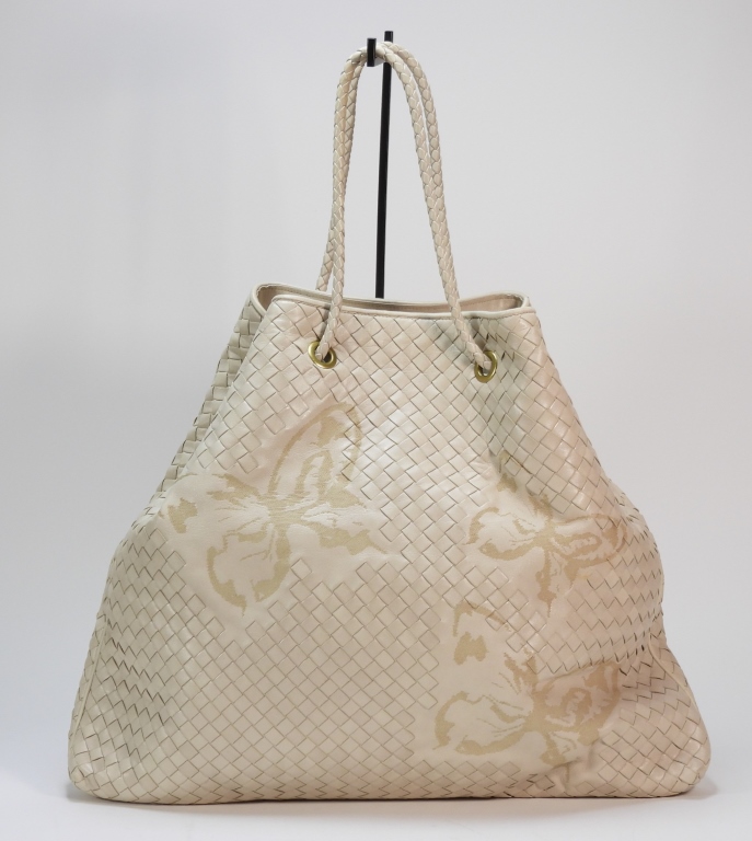 Appraisal: BOTTEGA VENETA CREAM LEATHER BASKET WEAVE BAG Double handled cream