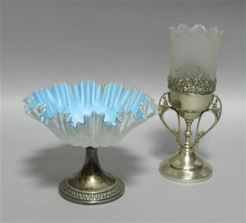 Appraisal: FLUTED BLUE SATIN CASED GLASS CENTERPIECE With frilled rim on