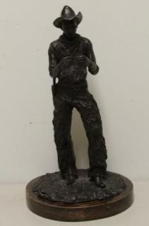 Appraisal: PHILLIPS Gordon Signed Bronze of a Cowboy Taking a Break