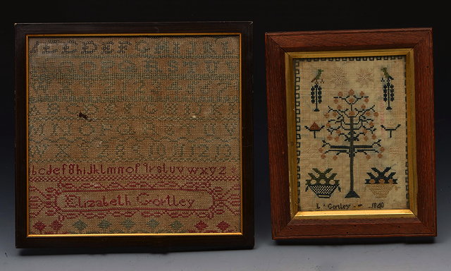 Appraisal: TWO SMALL TRADITIONAL CHILD'S SAMPLERS with tree and alphabet decoration