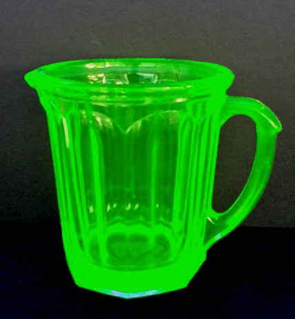 Appraisal: Vintage A J Vaseline Glass Juice Pitcher Clearly marked on