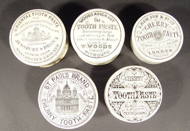 Appraisal: Five Victorian advertising pot lids and bases transfer printed with