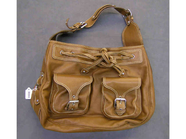 Appraisal: Saddle brown leather Marc Jacobs handbag with drawstring closure leather