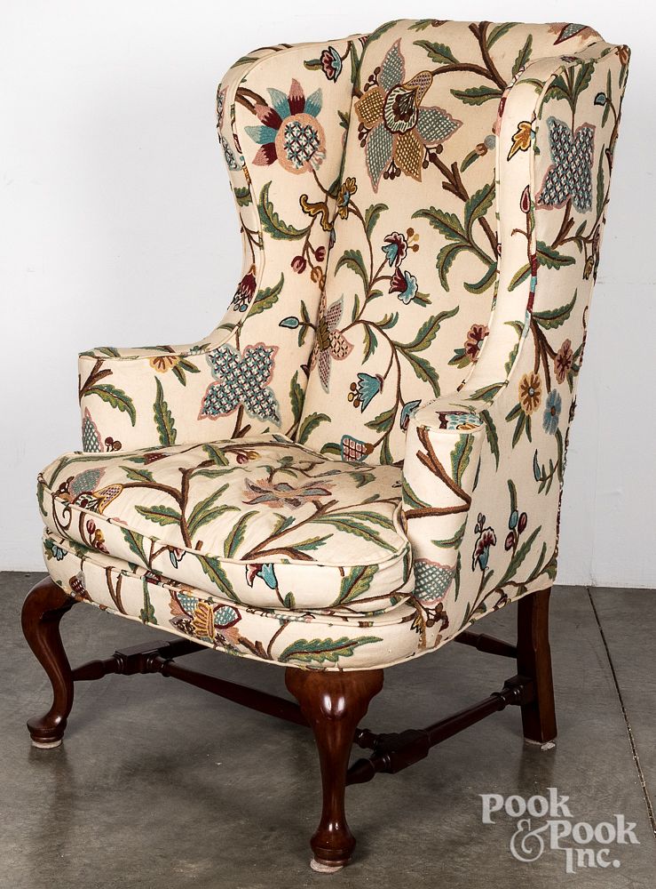 Appraisal: Queen Anne style wing chair Queen Anne style wing chair