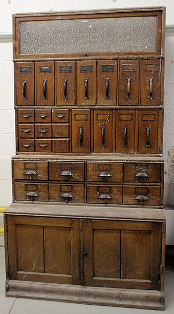 Appraisal: Two oak stacking cabinets removed from the corporate offices of