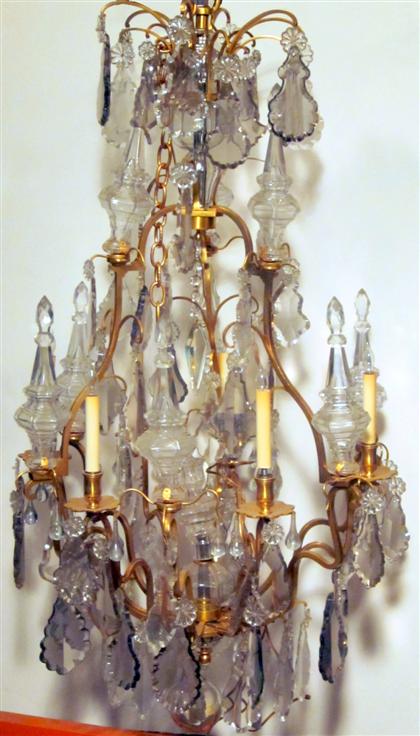 Appraisal: Louis XVI style gilt bronze and luster twelve-branch seven-light chandelier