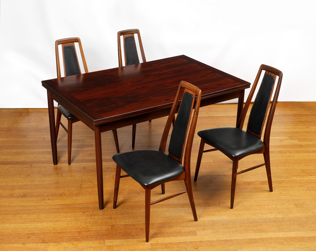 Appraisal: KOFOD-LARSEN ROSEWOOD EXTENSION TABLE AND CHAIRS Unmarked attributed Kofod-Larsen rectangular