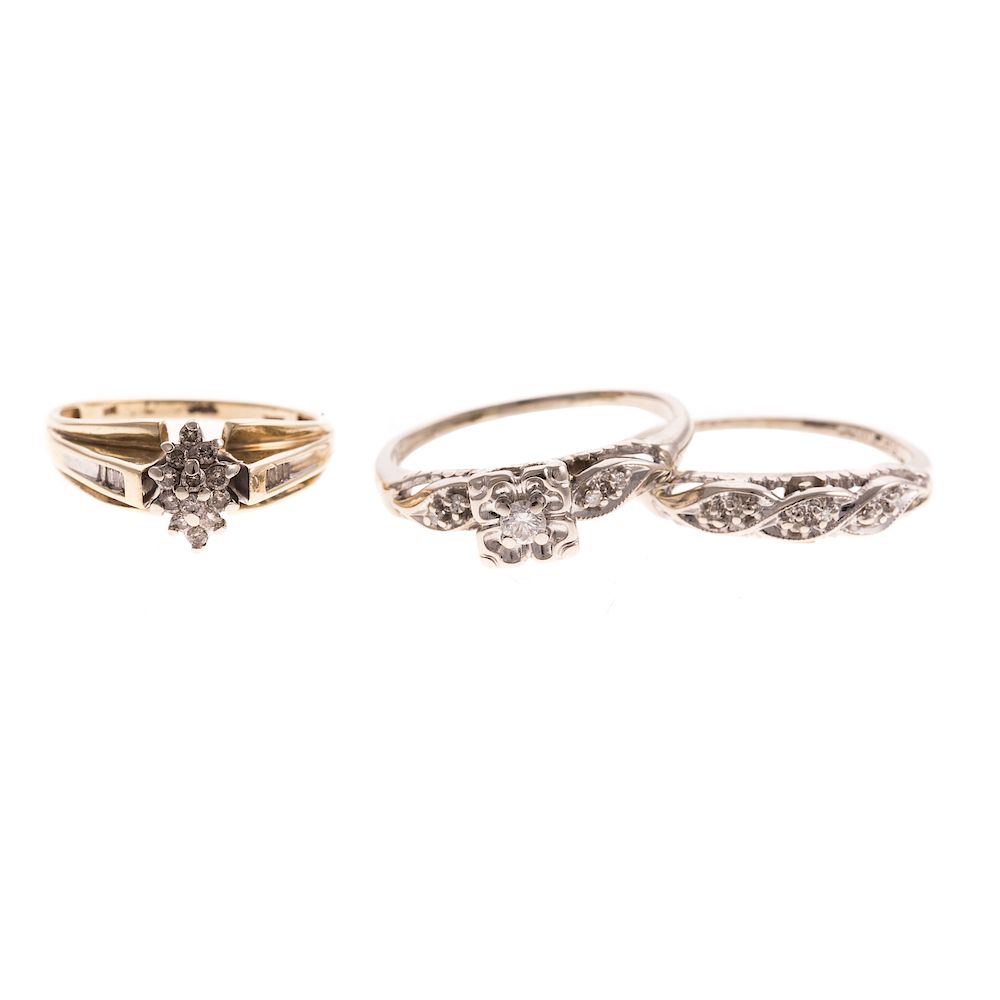 Appraisal: A Trio of Diamond Engagement Rings Bands in Gold K