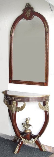 Appraisal: EGYPTIAN REVIVAL ORMOLU MOUNTED HALL TABLE MIRROR Demi table features