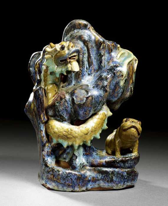 Appraisal: VASE WITH DRAGON AND DOG China Shiwan th century H