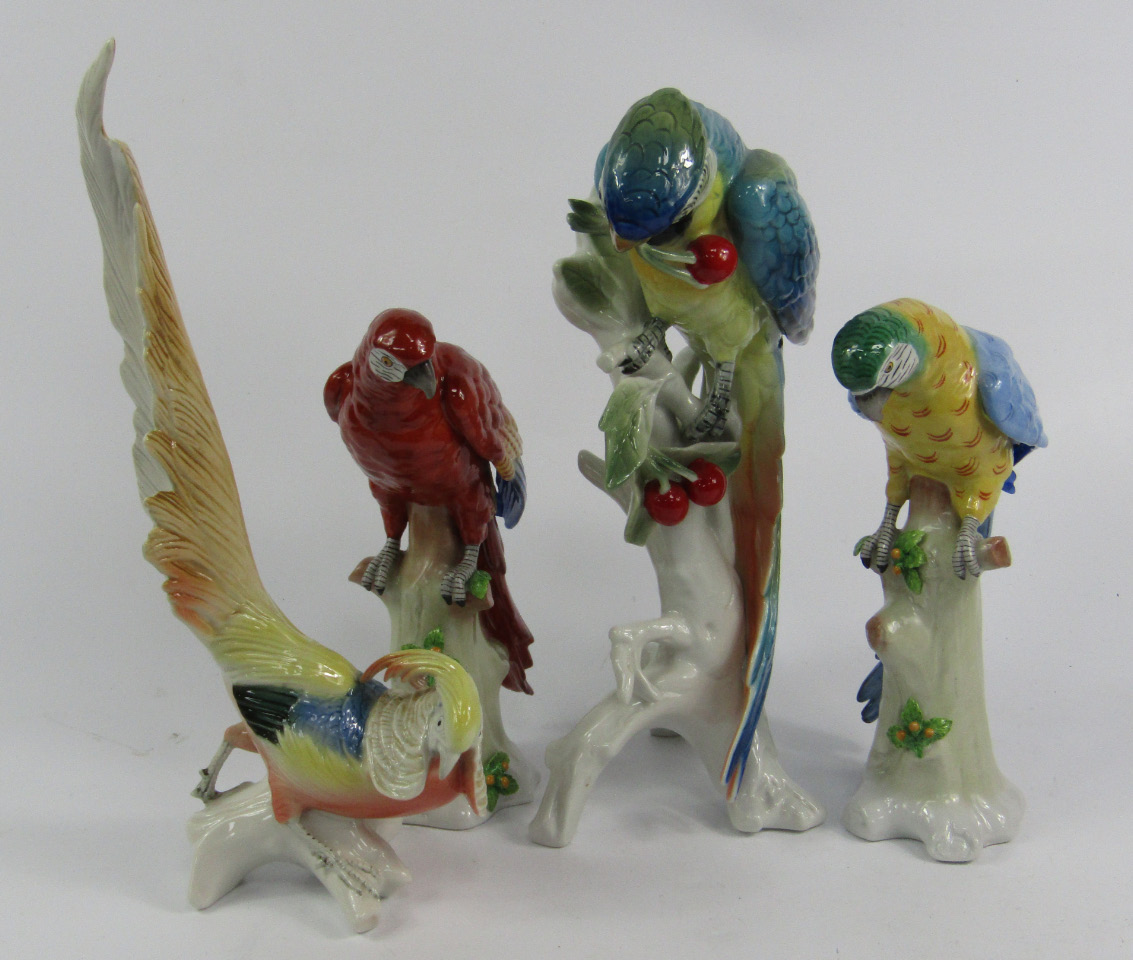 Appraisal: A pair of Sitzendorf porcelain figures of parakeets modelled perched