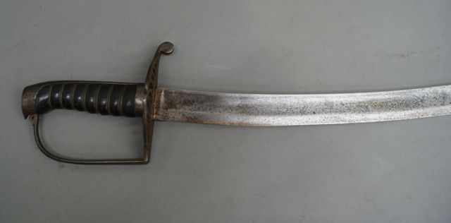 Appraisal: A European Light Cavalry sword inch curved blade pitted with