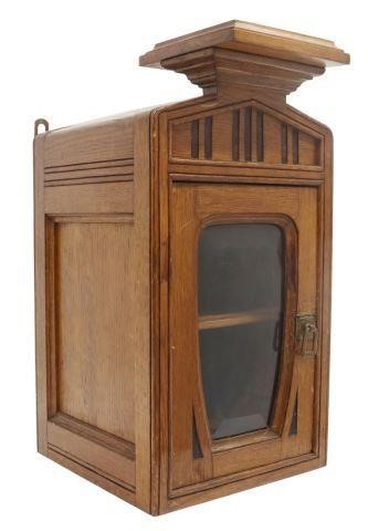 Appraisal: Italian oak hanging cabinet carved linear design throughout with beveled