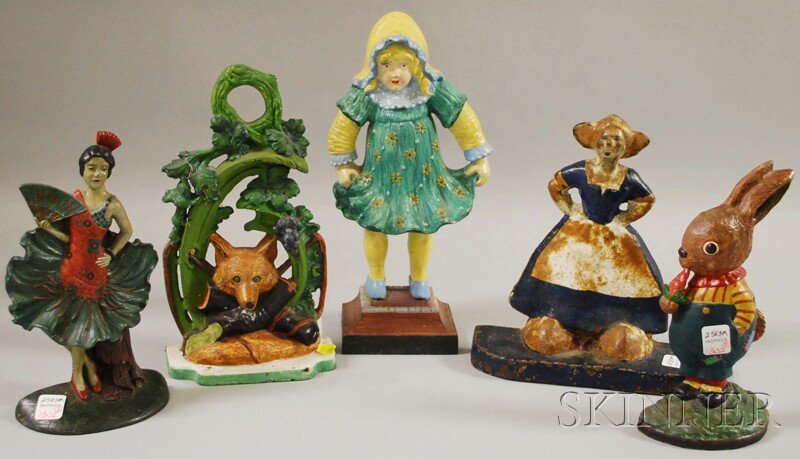 Appraisal: Five Painted Cast Iron Figural Doorstops a Dutch girl rabbit