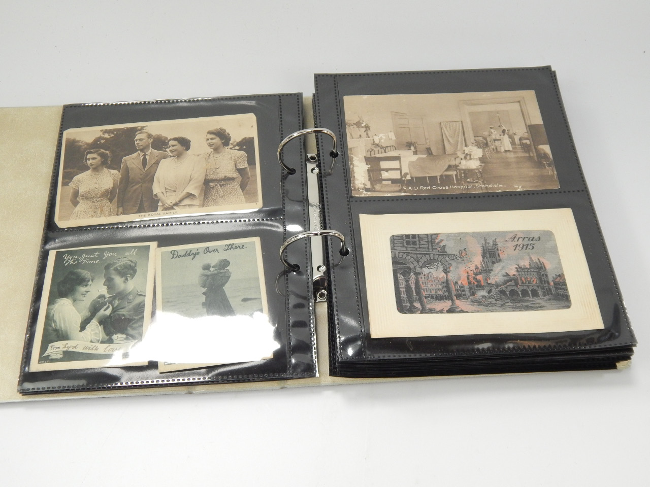 Appraisal: A postcard album containing WWI comic Royal Family and real