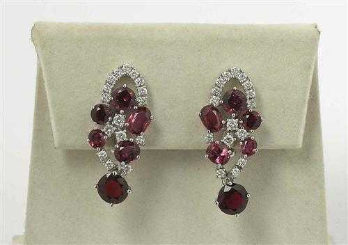 Appraisal: RUBY AND BRILLIANT-CUT DIAMOND CLIP EARRINGS White gold Very decorative