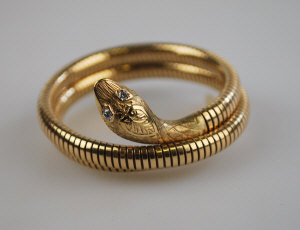 Appraisal: ct yellow gold coiled gas pipe style snake bracelet having