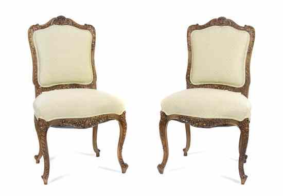 Appraisal: A Pair of Victorian Side Chairs having wood frames with