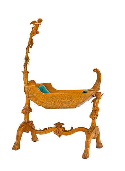 Appraisal: A wonderful Italian Rococo carved fruitwood cradle third quarter th