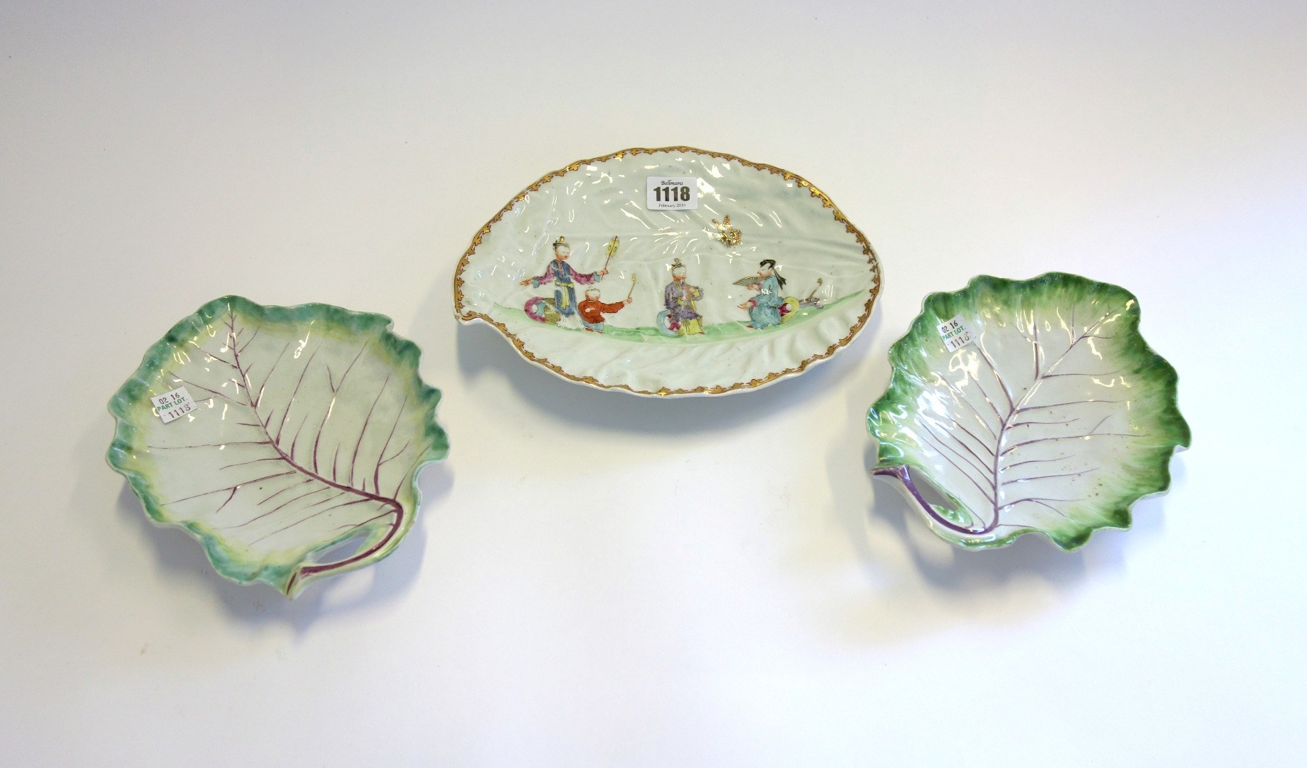 Appraisal: A Worcester cabbage leaf moulded dish circa painted with four