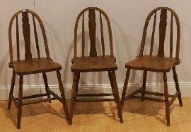 Appraisal: A set of three th century Australian pine kitchen chairs