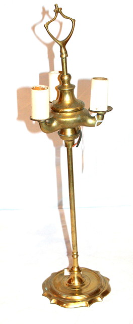 Appraisal: AN INDIAN BRASS THREE BRANCH STUDENT LAMP on a shaped