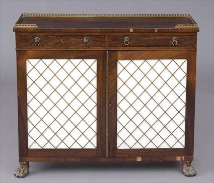 Appraisal: REGENCY GILT-METAL AND BRASS-MOUNTED ROSEWOOD SIDE CABINET The pierced -galleried